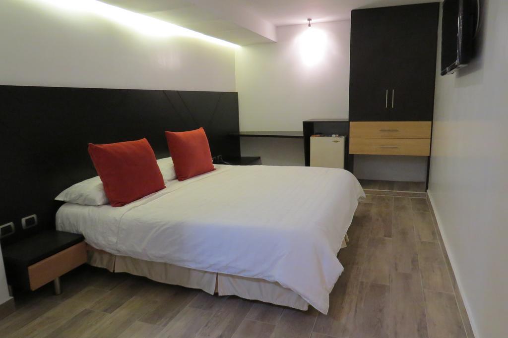 Hotel León Dorado Bucaramanga Habitación foto